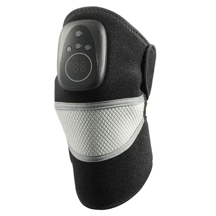 Black 163 heated knee support with a control head on the outer panel, on a plain background.